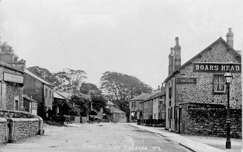 Main Street 1912.JPG - View of Main Street looking towards Kayley Hill, with the Boar's Head on right; advertising their  Good Stabling .  The sign for the Tea Rooms can be seen at the end of the row, on the corner with Station Road. This is a postcard written on 25th April 1912 - the reverse is shown on the next image.